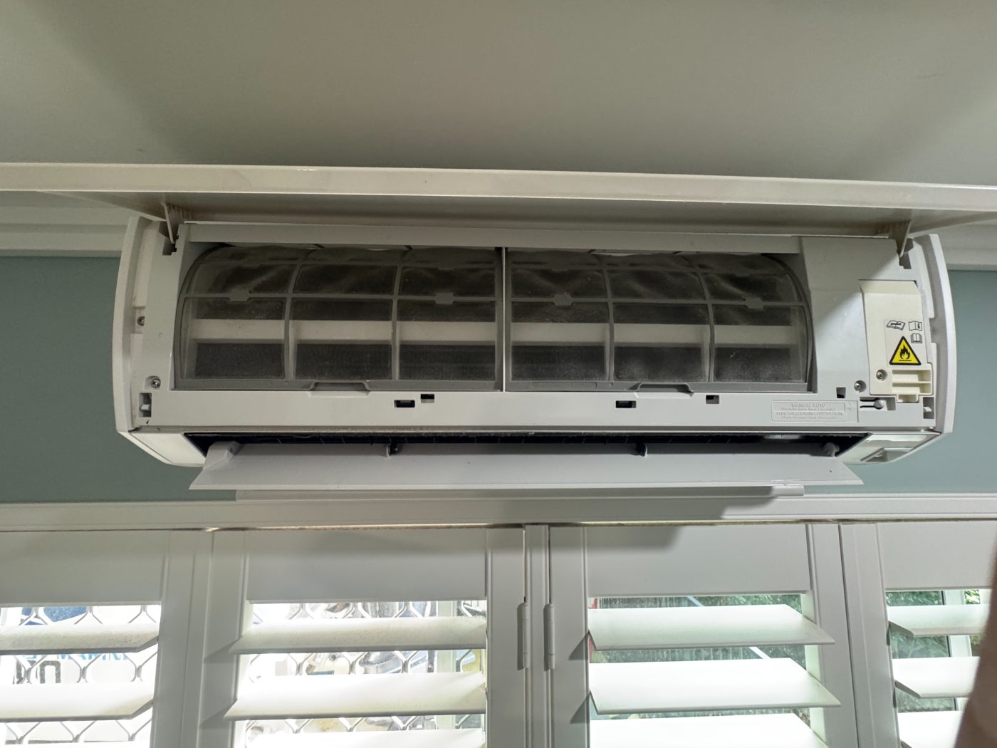 The same air conditioner clean and clear after an Airtek hydro chemical clean