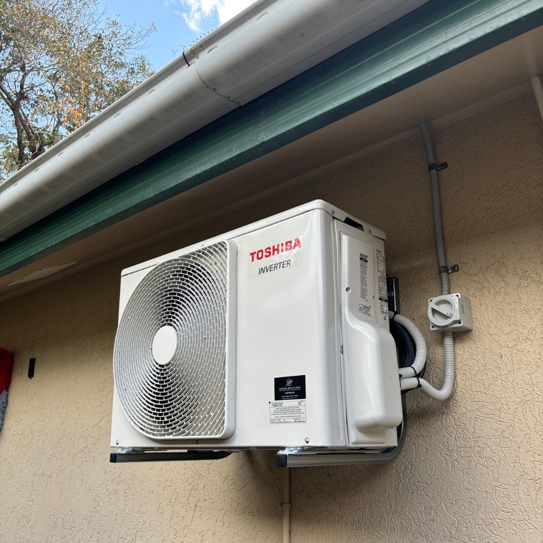 New Toshiba air conditioning outdoor unit after replacement at a Cairns property
