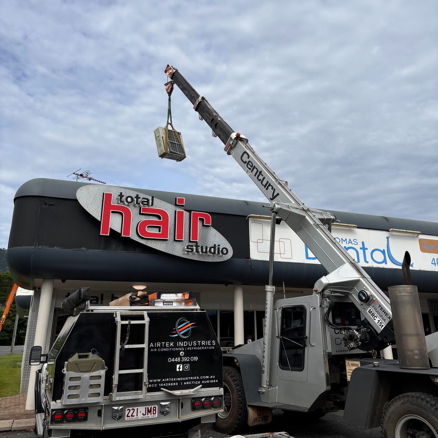Rooftop condenser maintained on a Far North Queensland commercial building