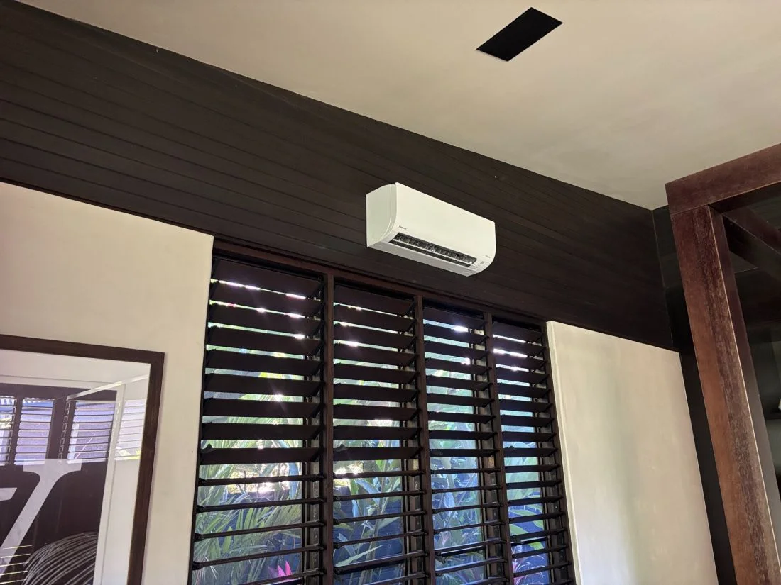 Split system air conditioner installed in a Cairns living room