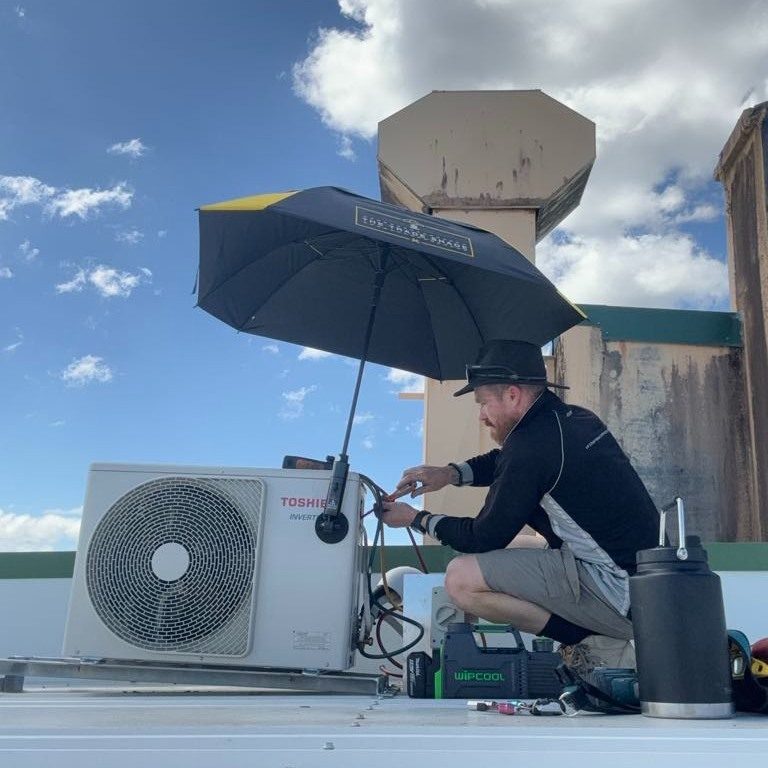 Under-ceiling air conditioning maintained at a managed Cairns site