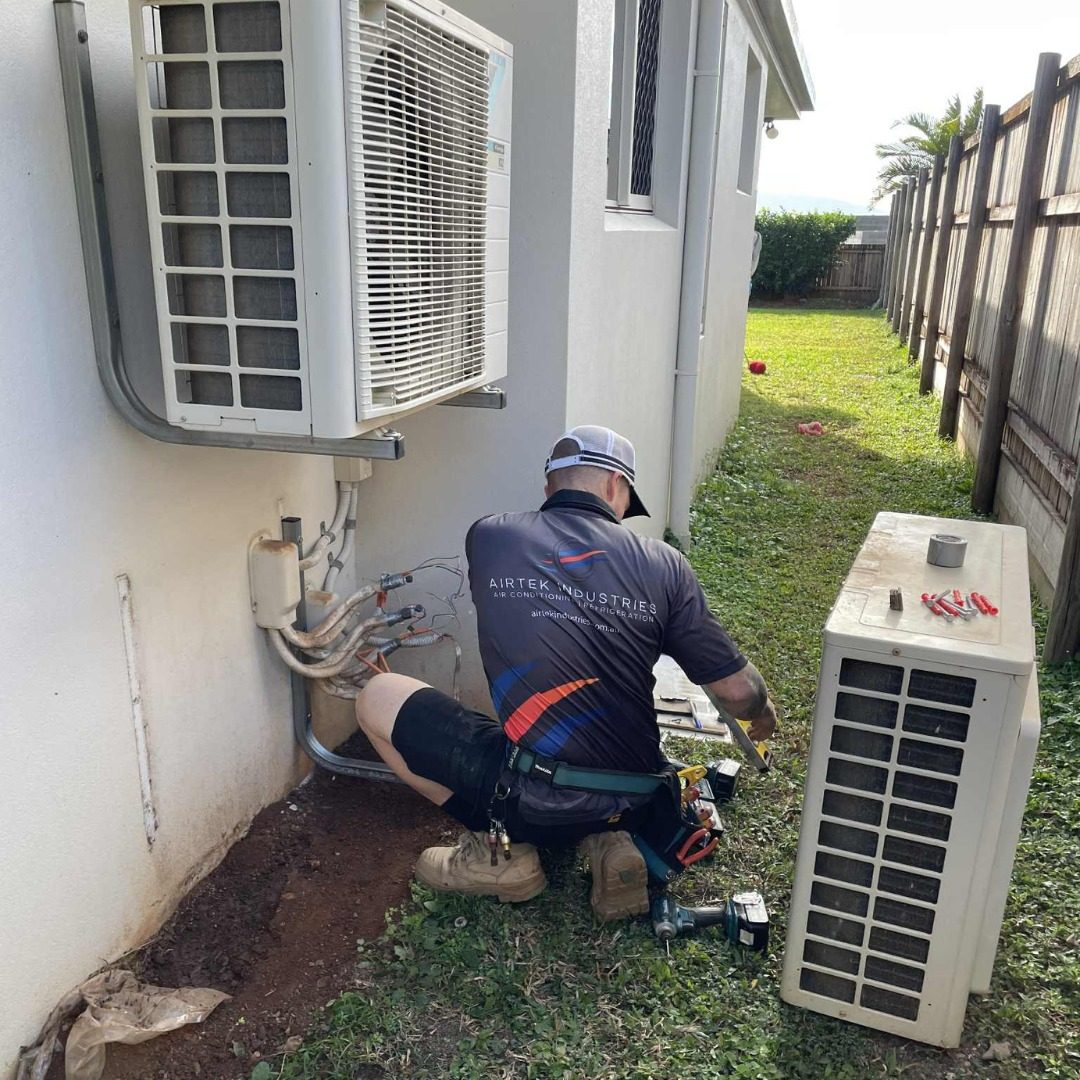 Airtek installing a split system outdoor unit at a Cairns home