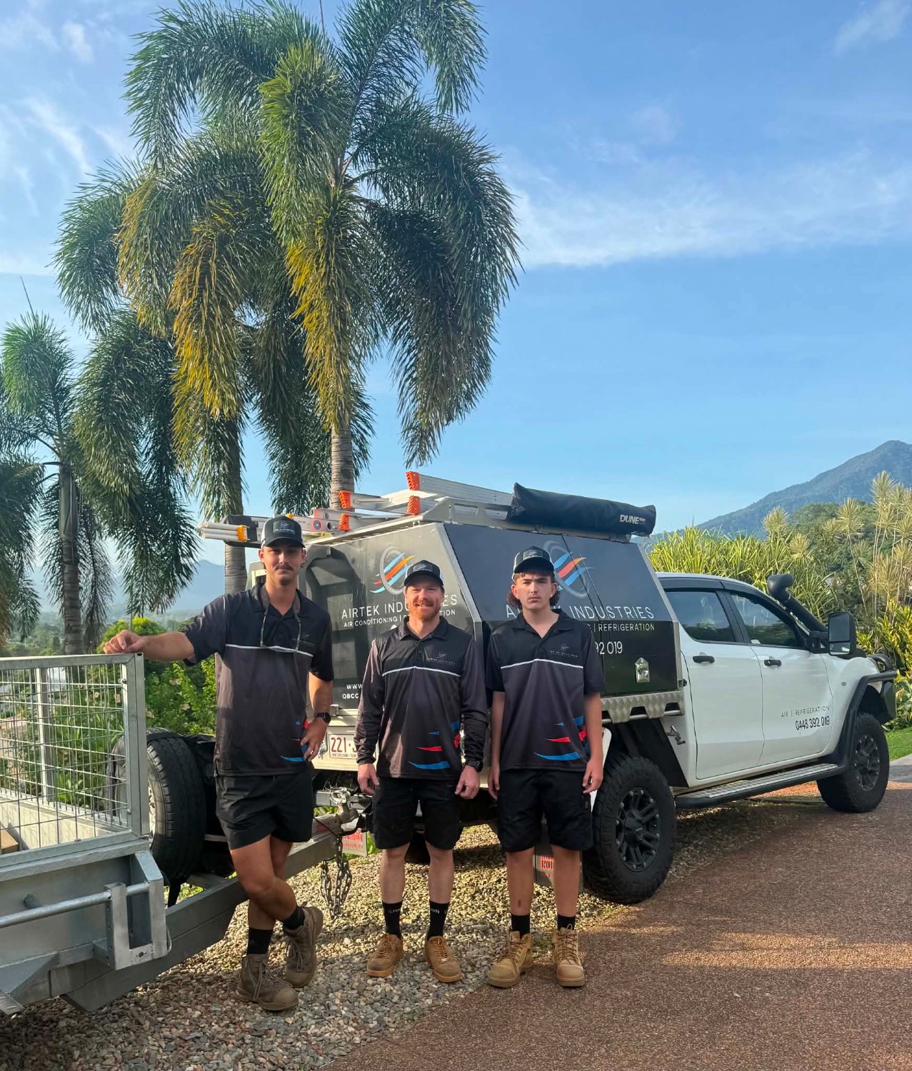 The Airtek Industries team with their service ute in Cairns